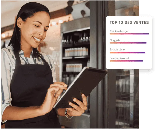 Une employée de restaurant saisit son stock sur tablette, avec le top 10 des ventes